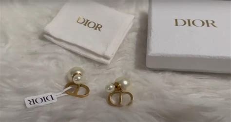 how to spot fake dior jewelry|dior earrings real or fake.